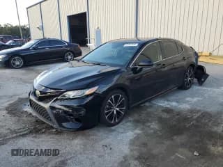 ✅ 2019 Toyota Camry SE • VIN: 4T1B11HK5KU736442 • Лот: 91657915. Опубликован ранее на Copart с пробегом 101 642 миль. Бесплатный доступ к архиву аукционных продаж из США и подробный отчёт об истории автомобиля на DreamBid. Изображение 1.