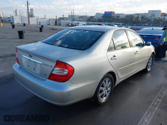 ✅ 2002 Toyota Camry XLE • VIN: JTDBF30K020058249 • Lot: 43419526. Wystawiony na IAAI z przebiegiem 185 552 mil. Bezpłatny archiwum sprzedaży aukcyjnych z USA i szczegółowy raport historii pojazdu na DreamBid. Zdjęcie 4.