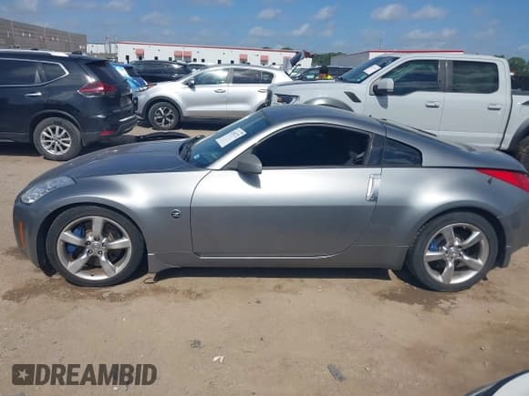 ✅ 2006 Nissan 350Z Enthusiast • VIN: JN1AZ34E86M380081 • Lot: 42551772. Wystawiony na IAAI z przebiegiem 86 847 mil. Bezpłatny archiwum sprzedaży aukcyjnych z USA i szczegółowy raport historii pojazdu na DreamBid. Zdjęcie 14.