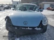 ✅ 2013 Volkswagen Beetle Fender Edition • VIN: 3VWJP7AT6DM694033 • Lot: 41661055. Listed on Copart with 55,836 mi. Free auction sales archive from the USA and detailed vehicle history report at DreamBid. Image 5.