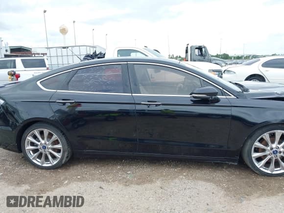 ✅ 2017 Ford Fusion Titanium • VIN: 3FA6P0K93HR186815 • Lot: 42595940. Listed on IAAI with 712,080 mi. Free auction sales archive from the USA and detailed vehicle history report at DreamBid. Image 13.