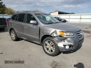 ✅ 2012 Hyundai Santa Fe SE • VIN: 5XYZHDAGXCG098035 • Lot: 75952204. Listed on Copart with 175,381 mi. Free auction sales archive from the USA and detailed vehicle history report at DreamBid. Image 4.