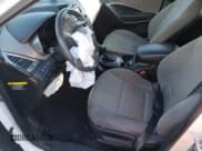 ✅ 2016 Hyundai Santa Fe • VIN: 5XYZTDLB0GG376012 • Лот: 39110784. Опубликован ранее на Copart с пробегом Не указан. Бесплатный доступ к архиву аукционных продаж из США и подробный отчёт об истории автомобиля на DreamBid. Изображение 7.