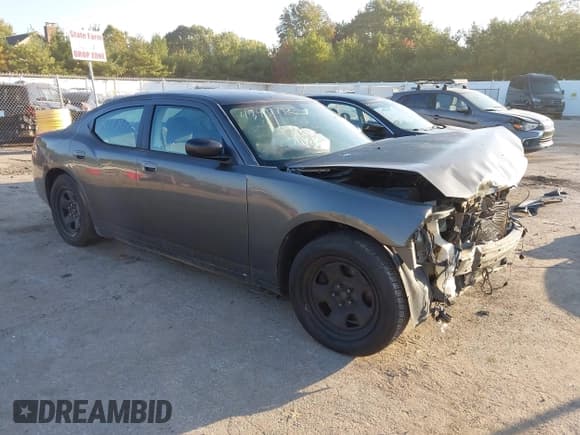 ✅ 2010 Dodge Charger Police • VIN: 2B3AA4CT5AH240559 • Lot: 43431732. Listed on IAAI with 119,900 mi. Free auction sales archive from the USA and detailed vehicle history report at DreamBid. Image 1.