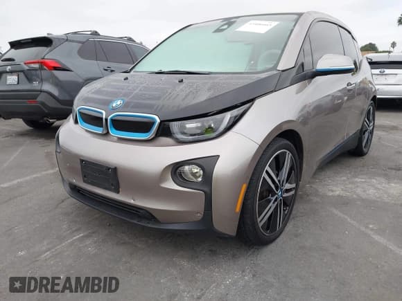 ✅ 2014 BMW i3 • VIN: WBY1Z2C52EV284866 • Lot: 43406665. Listed on IAAI with 82,650 mi. Free auction sales archive from the USA and detailed vehicle history report at DreamBid. Image 2.