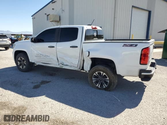 ✅ 2021 Chevrolet Colorado 2WD Z71 • VIN: 1GCGSDEN7M1201219 • Лот: 61310215. Опубликован ранее на Copart с пробегом 184 819 миль. Бесплатный доступ к архиву аукционных продаж из США и подробный отчёт об истории автомобиля на DreamBid. Изображение 2.
