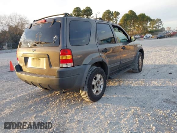 ✅ 2002 Ford Escape XLT Choice • VIN: 1FMYU03112KE00910 • Lot: 43698982. Listed on IAAI with 182,906 mi. Free auction sales archive from the USA and detailed vehicle history report at DreamBid. Image 4.