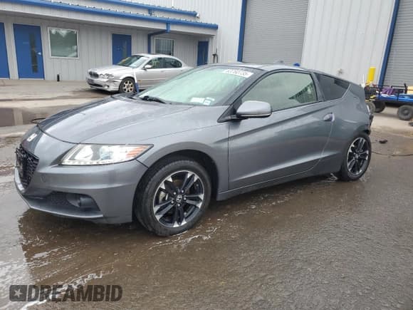 ✅ 2015 Honda CR-Z EX • VIN: JHMZF1D62FS003150 • Lot: 63760735. Listed on Copart with 94,270 mi. Free auction sales archive from the USA and detailed vehicle history report at DreamBid. Image 1.