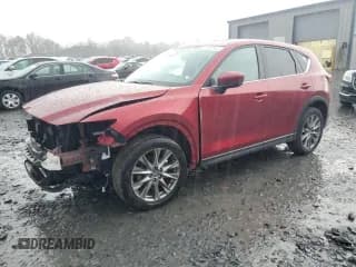 ✅ 2021 Mazda CX-5 Grand Touring • VIN: JM3KFBDM3M1301711 • Лот: 91493645. Опубликован ранее на Copart с пробегом 72 226 миль. Бесплатный доступ к архиву аукционных продаж из США и подробный отчёт об истории автомобиля на DreamBid. Изображение 1.