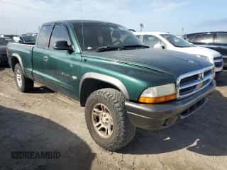 2002 Dodge Dakota z VIN 1B7GG12X52S705975, wystawiony jako Copart lot #75224734 z przebiegiem 150 441 mil mil oraz Szkoda całkowita • Salvage title. Historia ofert i sprzedaży dostępna na DreamBid. Obrazek 4.