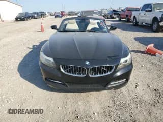 ✅ 2012 BMW Z4 sDrive28i • VIN: WBALL5C5XCE716711 • Лот: 75706534. Опубликован ранее на Copart с пробегом 89 948 миль. Бесплатный доступ к архиву аукционных продаж из США и подробный отчёт об истории автомобиля на DreamBid. Изображение 5.