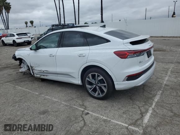 ✅ 2023 Audi Q4 e-tron Sportback Prestige • VIN: WA142BFZXPP076866 • Лот: 52849955. Опубликован ранее на Copart с пробегом 9 045 миль. Бесплатный доступ к архиву аукционных продаж из США и подробный отчёт об истории автомобиля на DreamBid. Изображение 2.