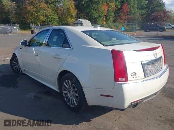 ✅ 2013 Cadillac CTS Luxury • VIN: 1G6DG5E57D0163994 • Lot: 43376631. Listed on IAAI with 132,088 mi. Free auction sales archive from the USA and detailed vehicle history report at DreamBid. Image 3.