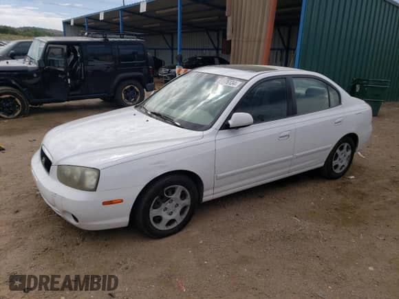 2002 Hyundai Elantra GLS z VIN KMHDN45D92U366486, wystawiony jako Copart lot #59576134 z przebiegiem 173 572 mil mil oraz Czysty tytuł • Clean title. Historia ofert i sprzedaży dostępna na DreamBid. Obrazek 1.