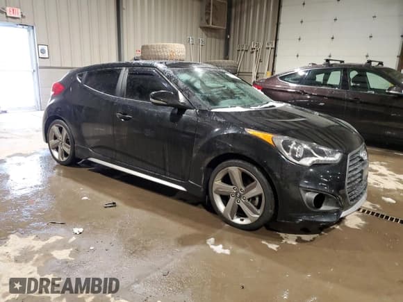 ✅ 2014 Hyundai Veloster Turbo • VIN: KMHTC6AE8EU182785 • Lot: 41662745. Listed on Copart with 89,228 mi. Free auction sales archive from the USA and detailed vehicle history report at DreamBid. Image 4.