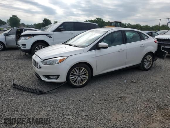 ✅ 2018 Ford Focus Titanium • VIN: 1FADP3J23JL280968 • Лот: 62513195. Опубликован ранее на Copart с пробегом 181 489 миль. Бесплатный доступ к архиву аукционных продаж из США и подробный отчёт об истории автомобиля на DreamBid. Изображение 1.