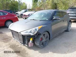 2014 Hyundai Veloster Turbo with VIN KMHTC6AE8EU185735, listed as a IAAI auction lot 43430533 with 120,337 mi miles and . Bid and sale history available at DreamBid. Image 2.