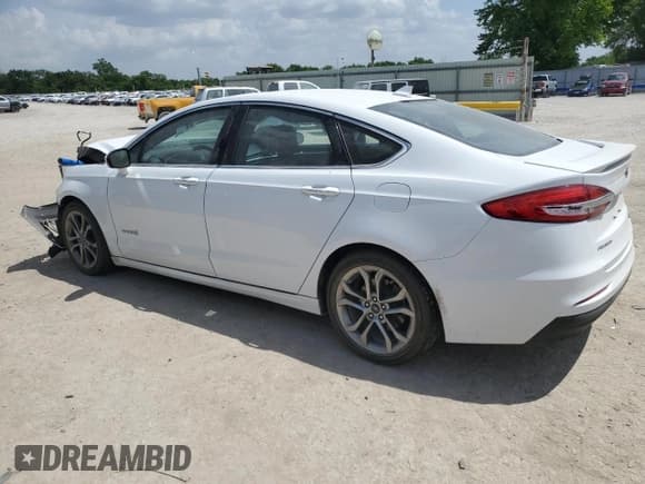 ✅ 2019 Ford Fusion Titanium • VIN: 3FA6P0RU1KR187513 • Лот: 57306155. Опубликован ранее на Copart с пробегом 82 559 миль. Бесплатный доступ к архиву аукционных продаж из США и подробный отчёт об истории автомобиля на DreamBid. Изображение 2.
