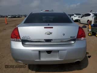 2009 Chevrolet Impala Police Police with VIN 2G1WS57MX91306644, listed as a Copart auction lot 70488495 with 152,101 mi miles and Salvage title. Bid and sale history available at DreamBid. Image 6.