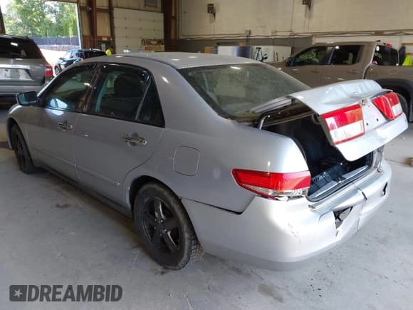 ✅ 2004 Honda Accord DX • VIN: 1HGCM55184A138824 • Lot: 43011734. Listed on IAAI with 216,840 mi. Free auction sales archive from the USA and detailed vehicle history report at DreamBid. Image 3.