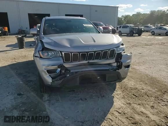 2021 Jeep Grand Cherokee Laredo E с VIN 1C4RJEAG2MC597556, выставлен на аукционе Copart как лот 86639715 с пробегом 75 520 миль миль и Списание • Salvage title. История ставок и продаж доступна на DreamBid. Изображение 14.