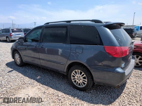 2009 Toyota Sienna LE with VIN 5TDBK23C09S023602, listed as a Copart auction lot 65241605 with 214,661 mi miles and Clean title. Bid and sale history available at DreamBid. Image 2.