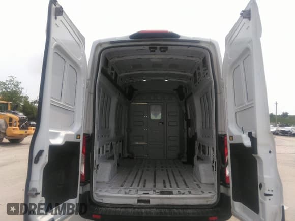 ✅ 2023 Ford Transit Cargo • VIN: 1FTBR2X87PKB02108 • Lot: 42432188. Listed on IAAI with 69,586 mi. Free auction sales archive from the USA and detailed vehicle history report at DreamBid. Image 8.