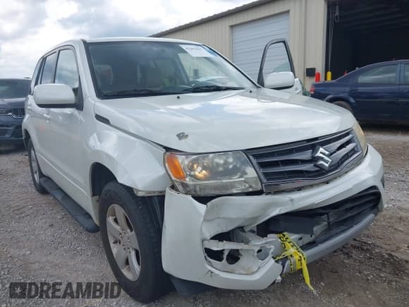 ✅ 2013 Suzuki Grand Vitara Premium • VIN: JS3TE0D68D4100201 • Lot: 42694457. Listed on IAAI with 126,585 mi. Free auction sales archive from the USA and detailed vehicle history report at DreamBid. Image 6.