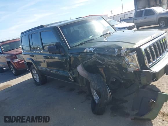 ✅ 2007 Jeep Commander Sport • VIN: 1J8HH48K67C533772 • Lot: 41033399. Listed on IAAI with 295,552 mi. Free auction sales archive from the USA and detailed vehicle history report at DreamBid. Image 13.