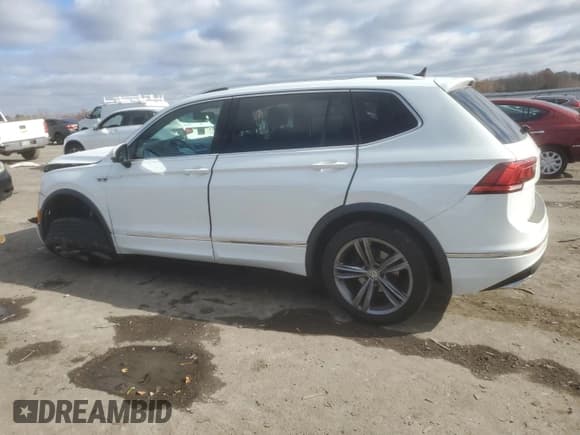 ✅ 2018 Volkswagen Tiguan SEL • VIN: 3VV3B7AX1JM149934 • Lot: 92750675. Listed on Copart with 103,636 mi. Free auction sales archive from the USA and detailed vehicle history report at DreamBid. Image 2.