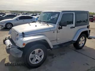 ✅ 2009 Jeep Wrangler Sahara • VIN: 1J4FA54169L780809 • Лот: 50598925. Опубликован ранее на Copart с пробегом 121 078 миль. Бесплатный доступ к архиву аукционных продаж из США и подробный отчёт об истории автомобиля на DreamBid. Изображение 1.