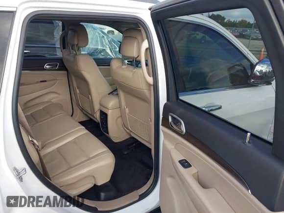 2018 Jeep Grand Cherokee Limited with VIN 1C4RJEBG5JC429811, listed as a IAAI auction lot 43370767 with 77,454 mi miles and . Bid and sale history available at DreamBid. Image 8.