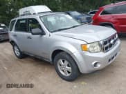 ✅ 2008 Ford Escape XLS • VIN: 1FMCU02Z78KE46851 • Lot: 43044540. Listed on IAAI with 163,933 mi. Free auction sales archive from the USA and detailed vehicle history report at DreamBid. Image 1.
