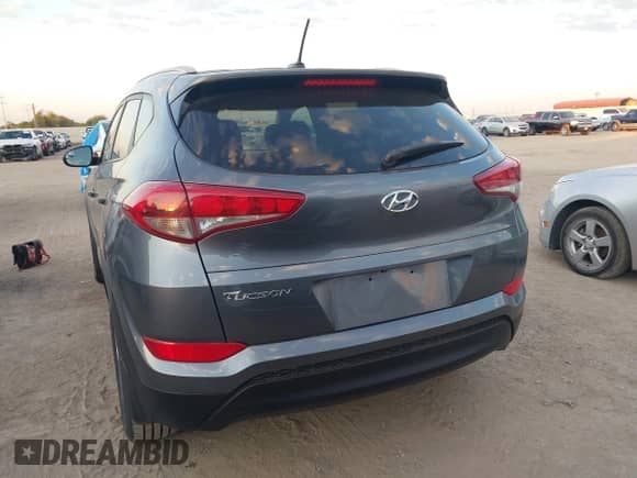 2016 Hyundai Tucson SE z VIN KM8J33A46GU235712, wystawiony jako IAAI lot #43602206 z przebiegiem 88 238 mil mil oraz . Historia ofert i sprzedaży dostępna na DreamBid. Obrazek 16.