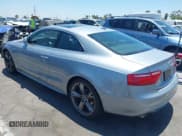 ✅ 2009 Audi A5 • VIN: WAUDK78T09A054860 • Lot: 42598757. Listed on IAAI with 25,861 mi. Free auction sales archive from the USA and detailed vehicle history report at DreamBid. Image 3.