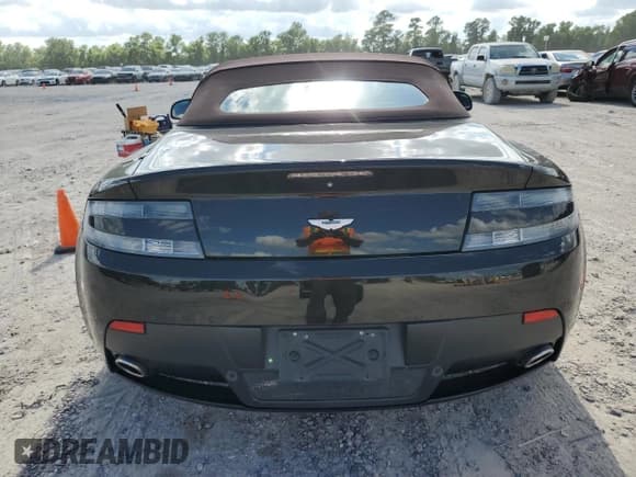 ✅ 2013 Aston Martin Vantage • VIN: SCFEKBBK1DGD17118 • Lot: 60636224. Wystawiony na Copart z przebiegiem 50 591 mil. Bezpłatny archiwum sprzedaży aukcyjnych z USA i szczegółowy raport historii pojazdu na DreamBid. Zdjęcie 6.