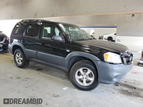 ✅ 2005 Mazda Tribute i • VIN: 4F2YZ02Z85KM44680 • Lot: 62363355. Listed on Copart with 193,068 mi. Free auction sales archive from the USA and detailed vehicle history report at DreamBid. Image 4.
