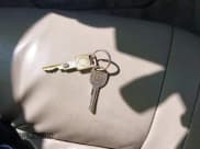 ✅ 2002 Cadillac Eldorado ESC • VIN: 1G6EL12Y52B105388 • Lot: 42423318. Listed on IAAI with 143,045 mi. Free auction sales archive from the USA and detailed vehicle history report at DreamBid. Image 11.