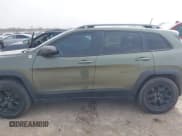 ✅ 2021 Jeep Cherokee Trailhawk • VIN: 1C4PJMBX6MD161982 • Lot: 41620867. Listed on IAAI with 54,471 mi. Free auction sales archive from the USA and detailed vehicle history report at DreamBid. Image 14.