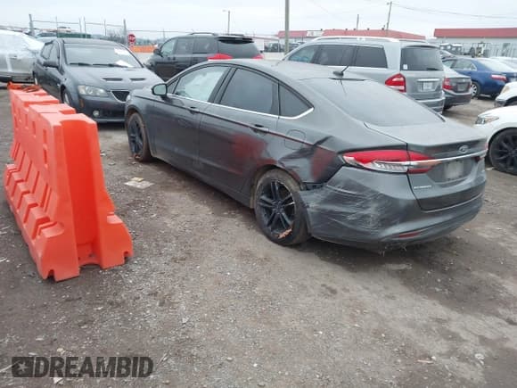 ✅ 2018 Ford Fusion SE • VIN: 3FA6P0H73JR103654 • Lot: 43762798. Listed on IAAI with 159,434 mi. Free auction sales archive from the USA and detailed vehicle history report at DreamBid. Image 3.
