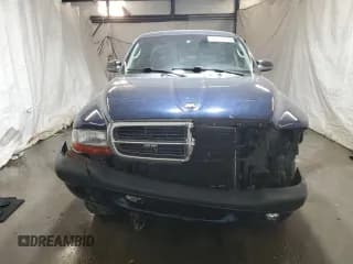 ✅ 2004 Dodge Dakota Sport • VIN: 1D7HG32N54S525290 • Lot: 77141804. Wystawiony na Copart z przebiegiem 217 012 mil. Bezpłatny archiwum sprzedaży aukcyjnych z USA i szczegółowy raport historii pojazdu na DreamBid. Zdjęcie 5.