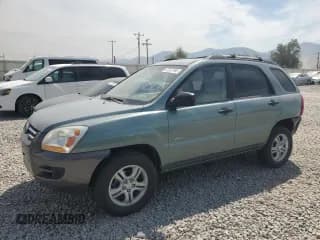 ✅ 2007 Kia Sportage EX • VIN: KNDJE723X77406844 • Лот: 67257945. Опубликован ранее на Copart с пробегом 189 301 миль. Бесплатный доступ к архиву аукционных продаж из США и подробный отчёт об истории автомобиля на DreamBid. Изображение 1.