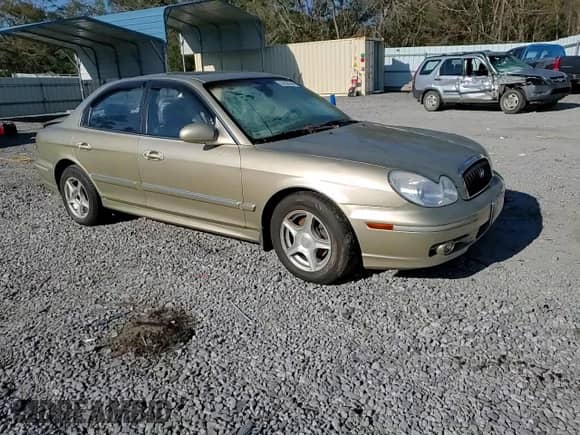 2004 Hyundai Sonata GLS с VIN KMHWF35H64A003084, выставлен на аукционе Copart как лот 83238544 с пробегом 179 054 миль миль и Списание • Salvage title. История ставок и продаж доступна на DreamBid. Изображение 11.