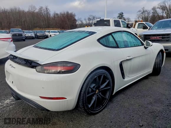 ✅ 2018 Porsche 718 Cayman • VIN: WP0AA2A81JK262696 • Lot: 94523435. Listed on Copart with 65,751 mi. Free auction sales archive from the USA and detailed vehicle history report at DreamBid. Image 3.