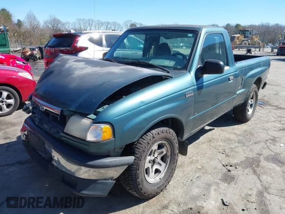 ✅ 2000 Mazda B-Series SX • VIN: 4F4YR12C3YTM23629 • Lot: 41624399. Wystawiony na IAAI z przebiegiem 289 626 mil. Bezpłatny archiwum sprzedaży aukcyjnych z USA i szczegółowy raport historii pojazdu na DreamBid. Zdjęcie 2.