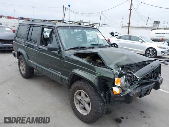 ✅ 1996 Jeep Cherokee Sport • VIN: 1J4FT68S6TL267408 • Lot: 42385629. Listed on IAAI with 268,753 mi. Free auction sales archive from the USA and detailed vehicle history report at DreamBid. Image 1.
