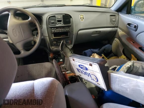 ✅ 2002 Kia Optima LX • VIN: KNAGD128925099335 • Lot: 44184335. Listed on Copart with 112,973 mi. Free auction sales archive from the USA and detailed vehicle history report at DreamBid. Image 8.