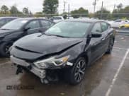 ✅ 2018 Nissan Maxima SL • VIN: 1N4AA6AP1JC396056 • Lot: 43557110. Wystawiony na IAAI z przebiegiem 122 919 mil. Bezpłatny archiwum sprzedaży aukcyjnych z USA i szczegółowy raport historii pojazdu na DreamBid. Zdjęcie 2.