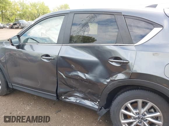 ✅ 2023 Mazda CX-5 S Select • VIN: JM3KFBBM5P0212476 • Lot: 43294036. Listed on IAAI with 16,991 mi. Free auction sales archive from the USA and detailed vehicle history report at DreamBid. Image 14.