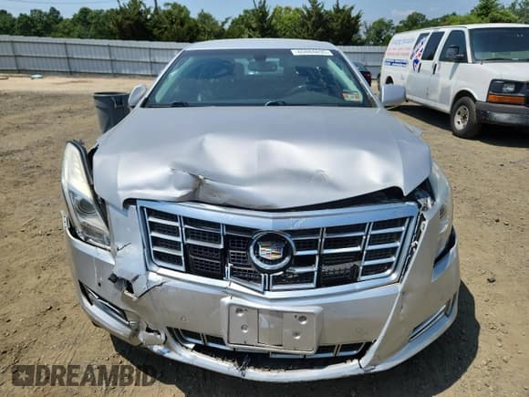 ✅ 2013 Cadillac XTS Luxury • VIN: 2G61R5S35D9220358 • Lot: 65884895. Wystawiony na Copart z przebiegiem 28 562 mil. Bezpłatny archiwum sprzedaży aukcyjnych z USA i szczegółowy raport historii pojazdu na DreamBid. Zdjęcie 5.